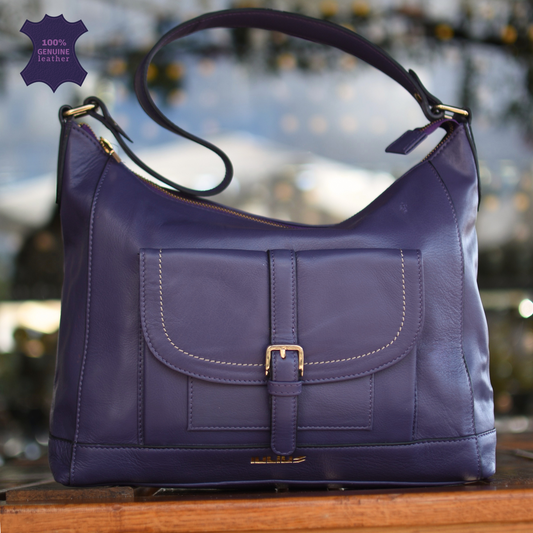 Purple genuine leather women’s handbag with wide strap