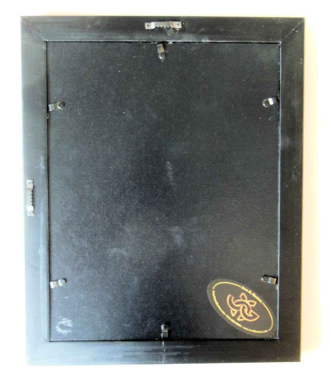 Tanzania- Intricately cut wood elephant on Fabric. Framed.