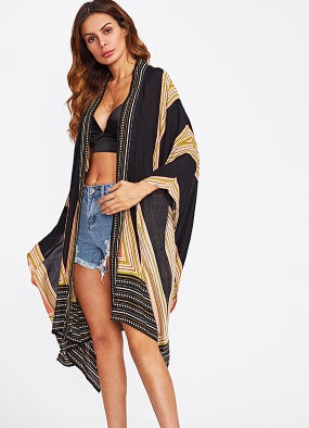 woman wearing boho safari kimono with vintage geometric print