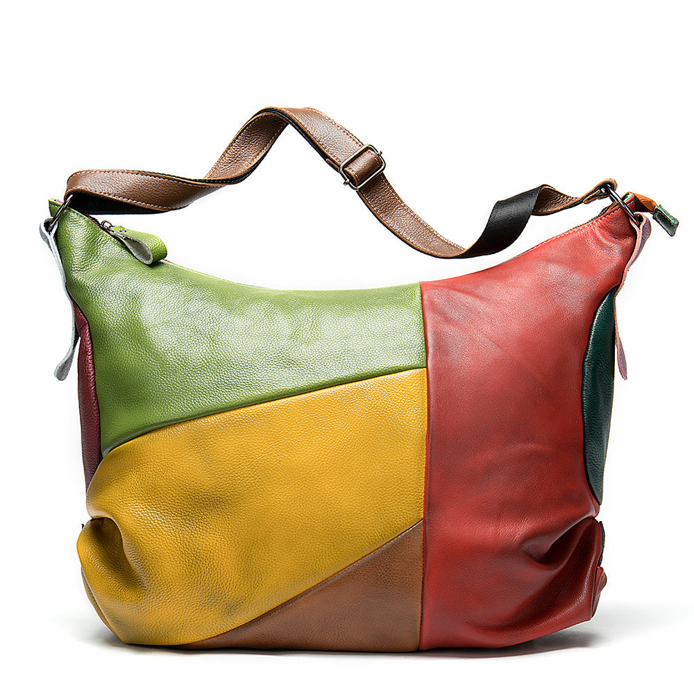 Genuine cowhide leather travel bag with a vintage, well-traveled look. Fits a 15" laptop and weekend essentials—your go-to weekender and carry on companion.
