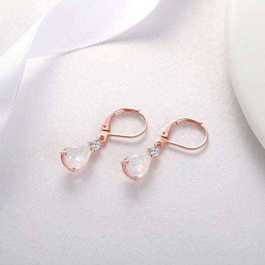 White opal teardrop earrings in rose gold with romantic drop design